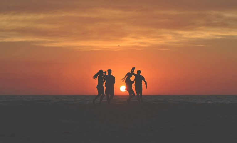uncovering layers javier allegue barros silhouette photo of four people dancing on sands near shoreline depicting ventral vagal nerve function unsplash